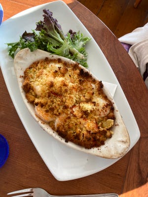 The Back Eddy has a Seafood Casserole special which is roasted leaks, soft cornbread crumbs, asparagus, lobster meat, shrimp, and scallops.