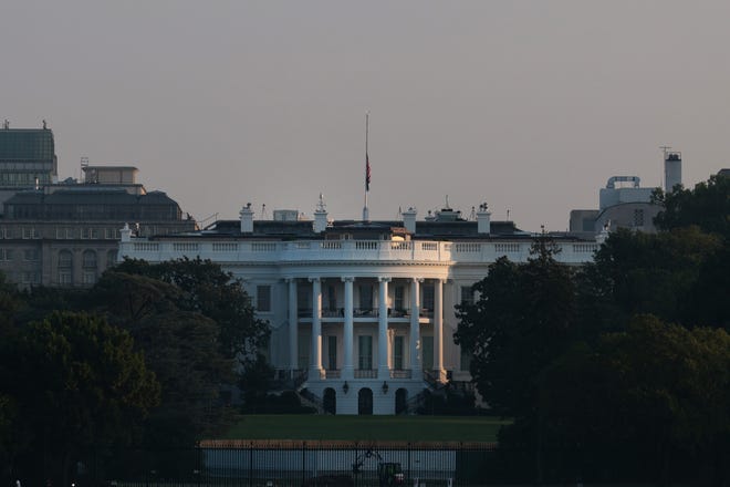 The flag atop the White House stands at half staff to honor the U.S. service members killed in terror attacks in Kabul, Afghanistan, on Aug. 27.