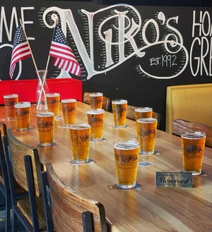 Niko's Bar & Gyros donates one dollar for every beer sold until September 11.  Funds will go to military families and charities.