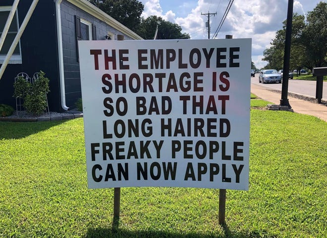 A sign located on the 4700 block of West Hundred Road in Chester, Va., references a line from the early '70s rock song 'Signs.'