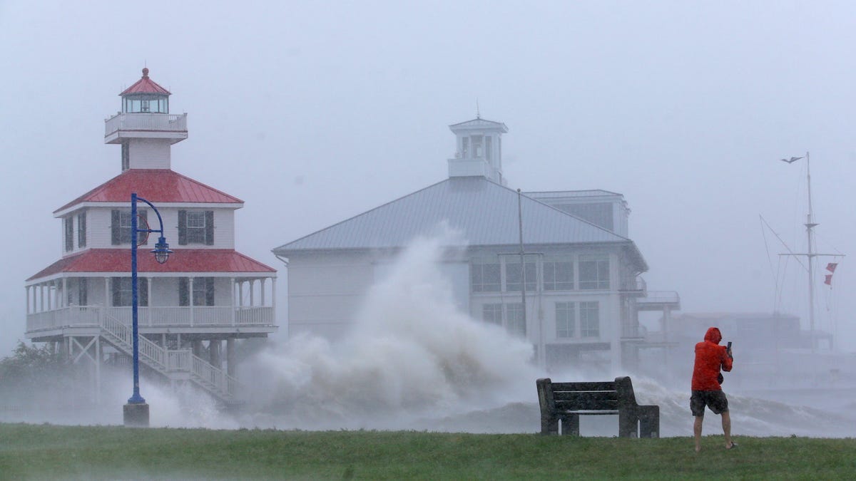 Waves crash against the New Canal Lighthouse on Lake Pontchartrain as Hurricane Ida approaches New Orleans on Aug. 29, 2021.