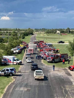 Fire department representatives from around south-central Kansas paid tribute to their fallen comrade, Mullinville Fire Chief Cody Sherer on August 20, 2021 in Kiowa County.