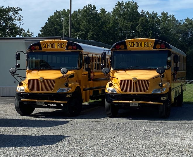 This photo shows Chesterfield school buses parked in a lot next to Carver Academy in Chester Monday, Aug. 30, 2021. The school system announced Monday it planned to boost driver pay by $3 an hour and offer $3,000 bonuses to reduce the roughly 100-driver shortage currently in the system.