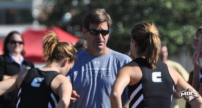 Bill Gautier talks to two of his runners at the University of Tennessee-Chattanooga. Gautier, who is a member of the 2021 class of the Henderson County Sports Hall of Fame, coached track and cross country at UTC for 24 years.