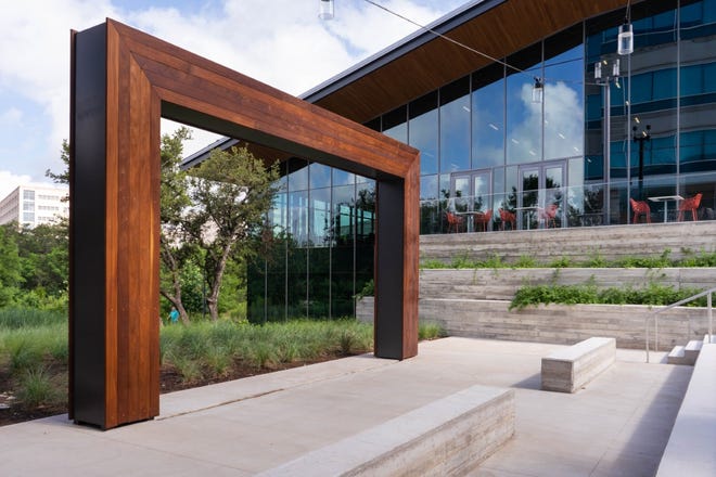 An amphitheater is featured outside of the amenities center on Charles Schwab’s campus near the Domain. The financial services company is adding about 450 employees at its Austin campus.