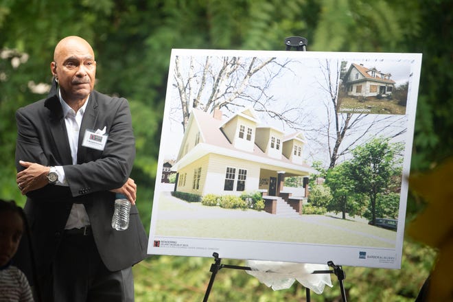 J. Bernard Drewery, board member of the Beck Cultural Exchange Center, shows a rendering of the new Delaney museum.