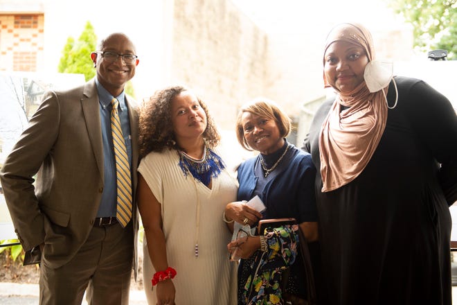 Derek Spratley (from left), attorney for the Delaney estate; Marissa Shrum, great-great-niece of Beauford and Joseph Delaney; Dorothy Lee, great-niece; and great-great-niece Imani Shula gather for the groundbreaking at the museum next to the Beck Cultural Exchange Center.