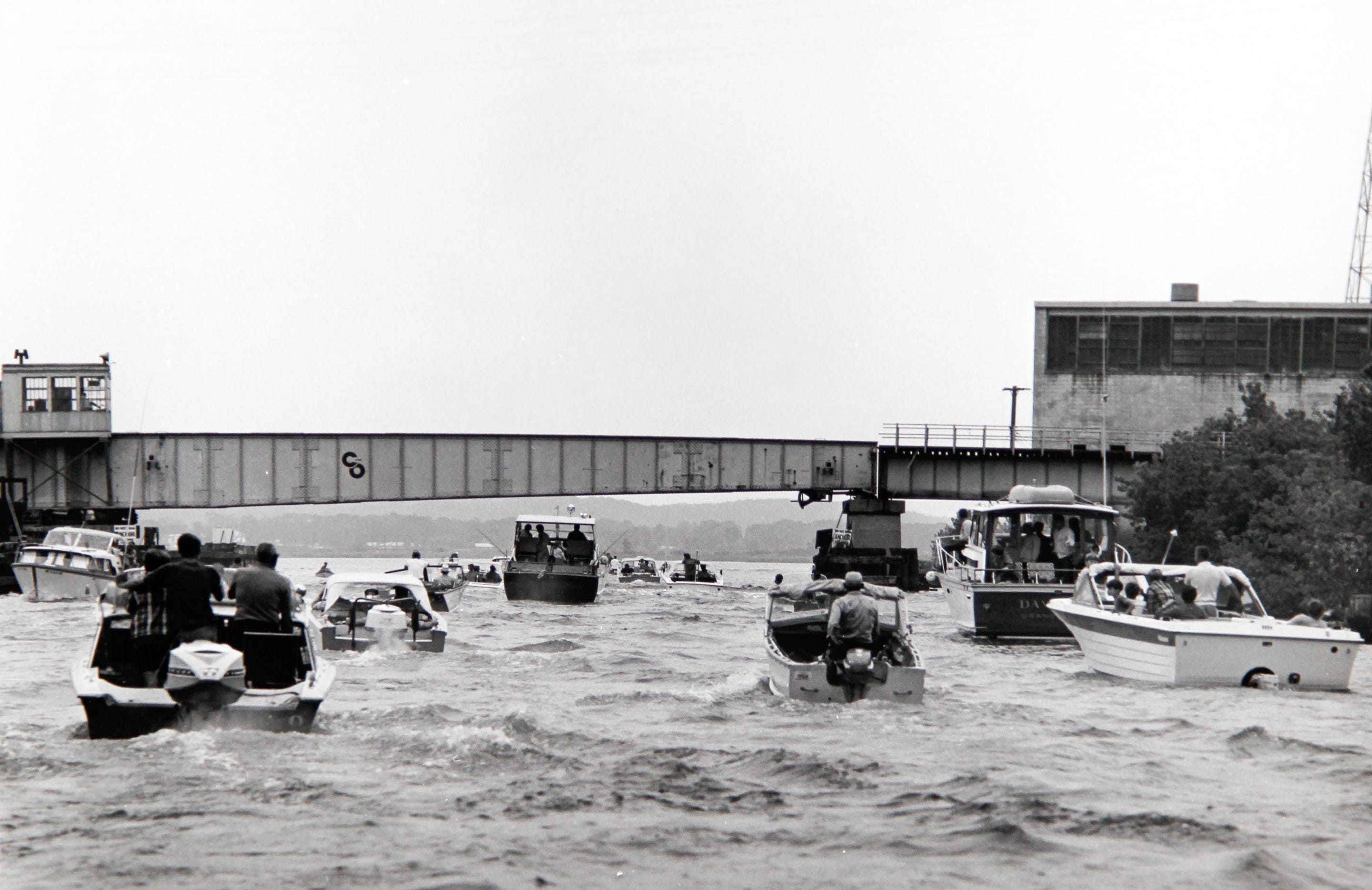 Anglers head out to salmon fish near the mouth of the Platte River in Michigan in the fall of 1967.  [Photo courtesy of Howard Tanner and the Michigan Department of Conservation] ORG XMIT: Milwaukee Journal Sentinel
