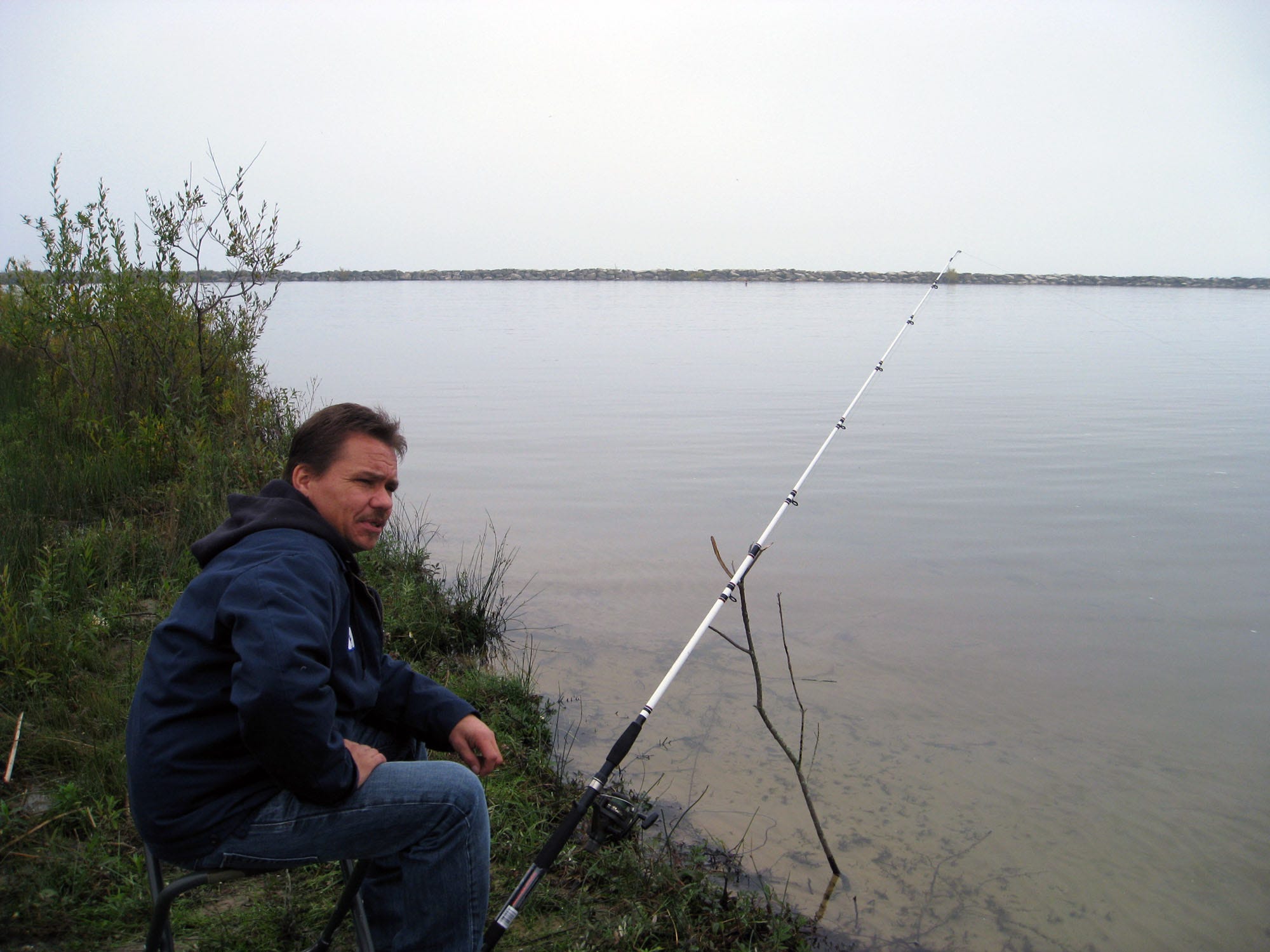 Jay Hall of Flint, Michigan drove about two hours from his home to go salmon fishing in Harrisville Michigan on Oct. 1. Hall didn't get a bite but remembers Harrisville swarming with salmon fisherman in 1989, the last time he went fishing along the Lake Huron shoreline. Since then the salmon population has declined significantly.