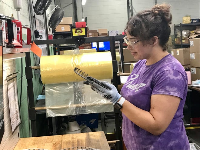 Backup Final Inspection Lead Rebecca Heard inspects springs at Port Huron manufacturer P.J. Wallbank Springs, Inc. on Aug. 31, 2021.