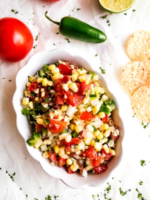 A salsa made with fresh summer corn, tomatoes, peppers and lime will compliment your Labor Day feast.