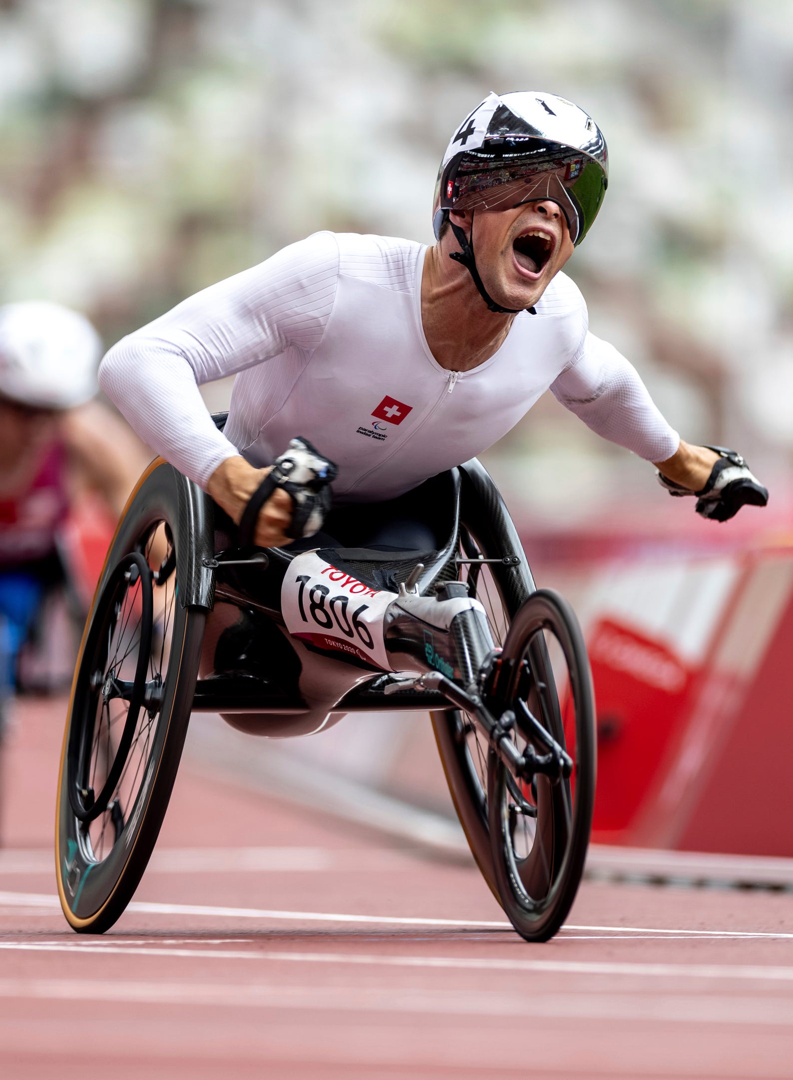 Aug. 31, 2021: Marcel Hug of Switzerland celebrates his gold medal finish in the Men's 1500-meter T54 Athletics Final.