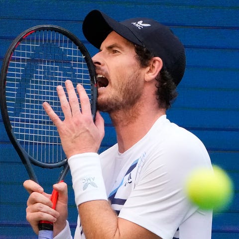 Andy Murray reacts during his first-round match ag