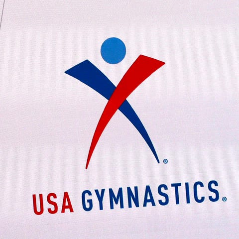 The USA Gymnastics logo is displayed at AT&T Stadi