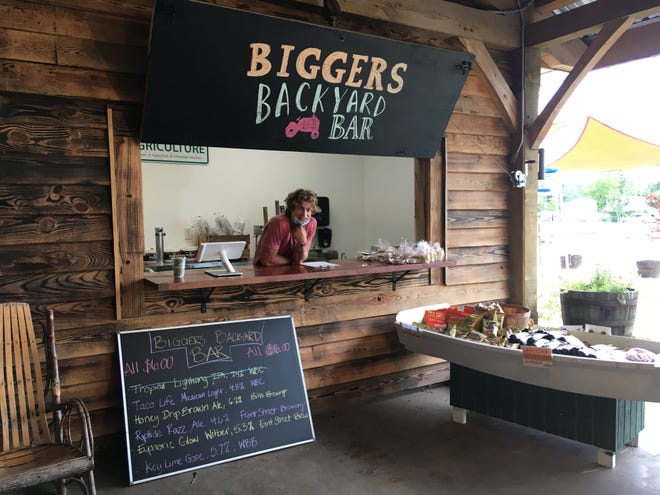 Biggers Market in Wilmington recently added a bar area where they sell local draft beer.