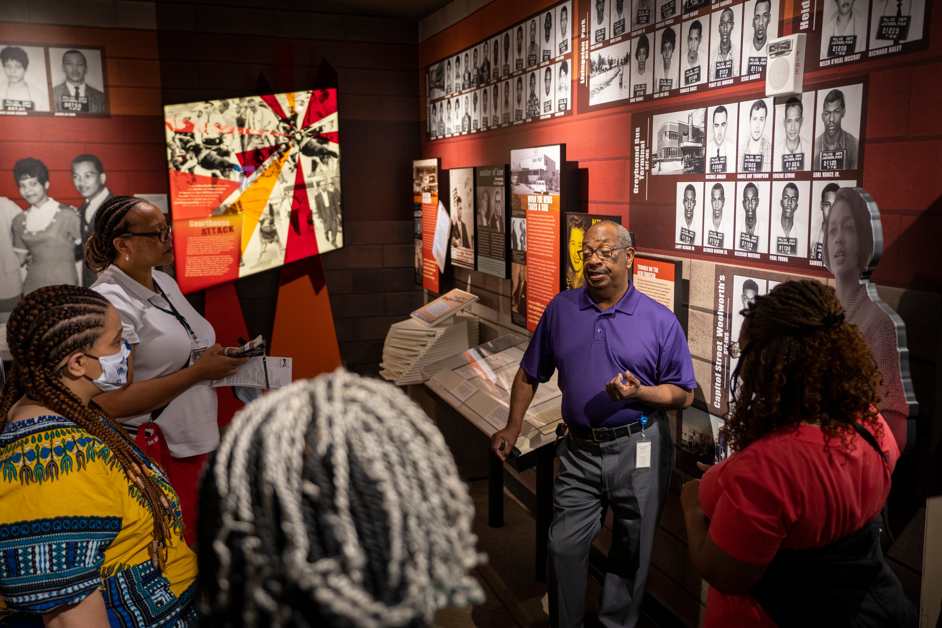 July 27, 2021; Jackson, Ms.; Hezekiah Watkins speaks with visitors in the Mississippi Civil Rights Museum. 

Watkins was arrested at the Greyhound Station in Jackson in 1961 at 13 years old, when he and a friend visited in the hopes of seeing The Freedom Riders. Since then, he has worked as a civil rights activist and has been arrested more than 100 times and seriously injured several times in civil rights efforts.