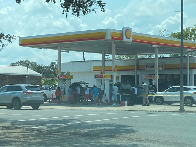 Long lines continued to form Sept. 2 at the Shell station on Marchand Drive in Donaldsonville.