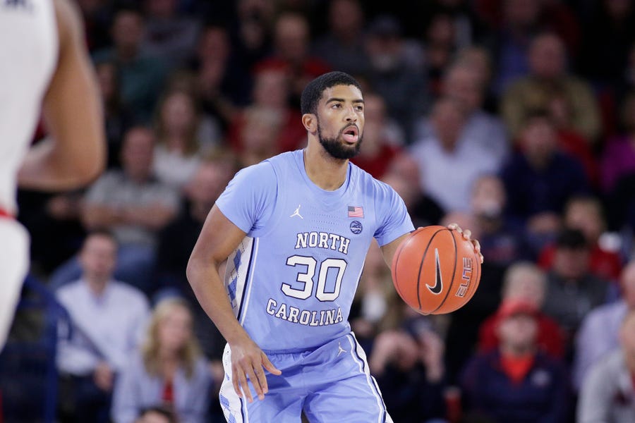 UNC's K.J. Smith played college basketball at the highest level. Now, he's covering it as an analyst