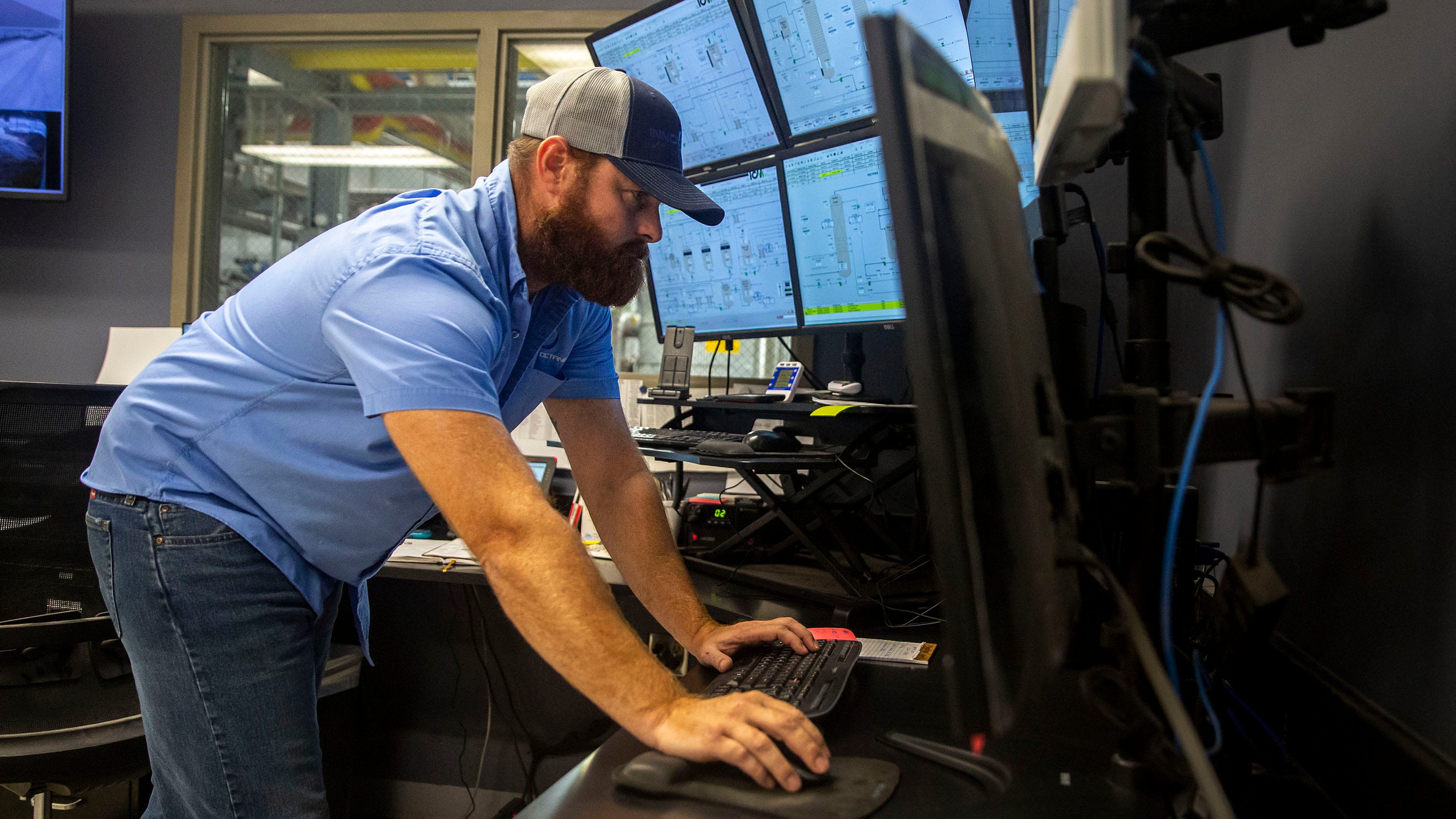 Ryan Kuhns, a shift leader at Elite Octane, a 200 million-gallon ethanol plant in western Iowa, keeps an eye on the plant's operations.
