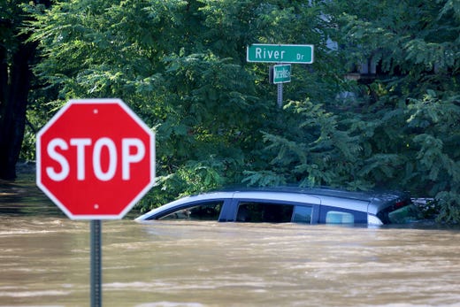 A submerged car on River Drive at Marcellus Place in Passaic Thursday morning, September 2, 2021.
