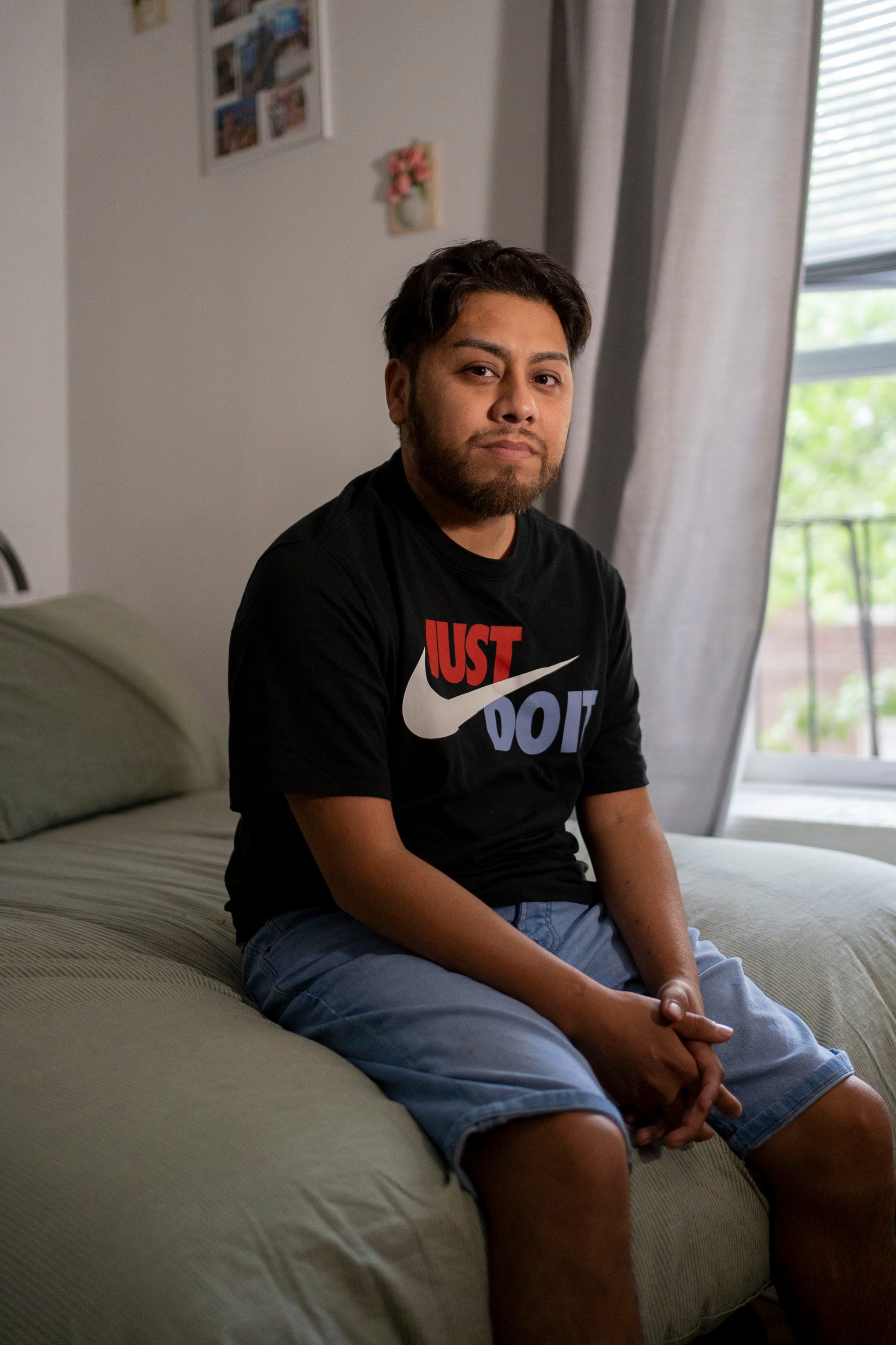 Aug 4, 2021; New York, NY, USA; Edwin "Avi" Luna shows his scars from his double-lung transplant surgery back in January of 2021. Due to COVID-19, Luna spent 11 months in the hospital. He was only 31-years-old when he caught the disease. Now at 33, Luna remains determined to work hard as he continues to recover. Mandatory credit: Michelle Hanks- USA TODAY