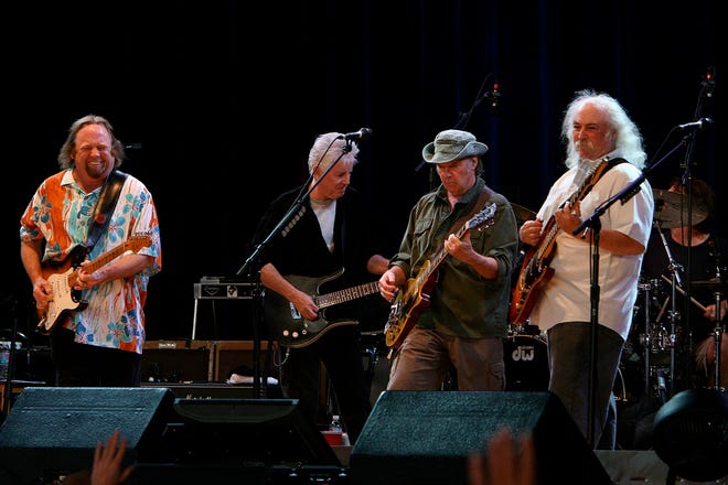 Stephen Stills, from left, Graham Nash, Neil Young and David Crosby perform during their Freedom of Speech tour in Auburn, Wash., on July 27, 2006.
