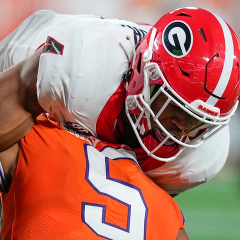 Clemson's DJ Uiagalelei is sacked by Quay Walker d