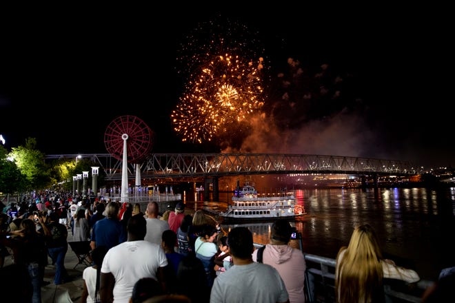 People watch the Western & Southern/WEBN fireworks show at Riverfest on Sunday, Sept. 5, 2021, at  Sawyer Point and Yeatman's Cove in Cincinnati. 