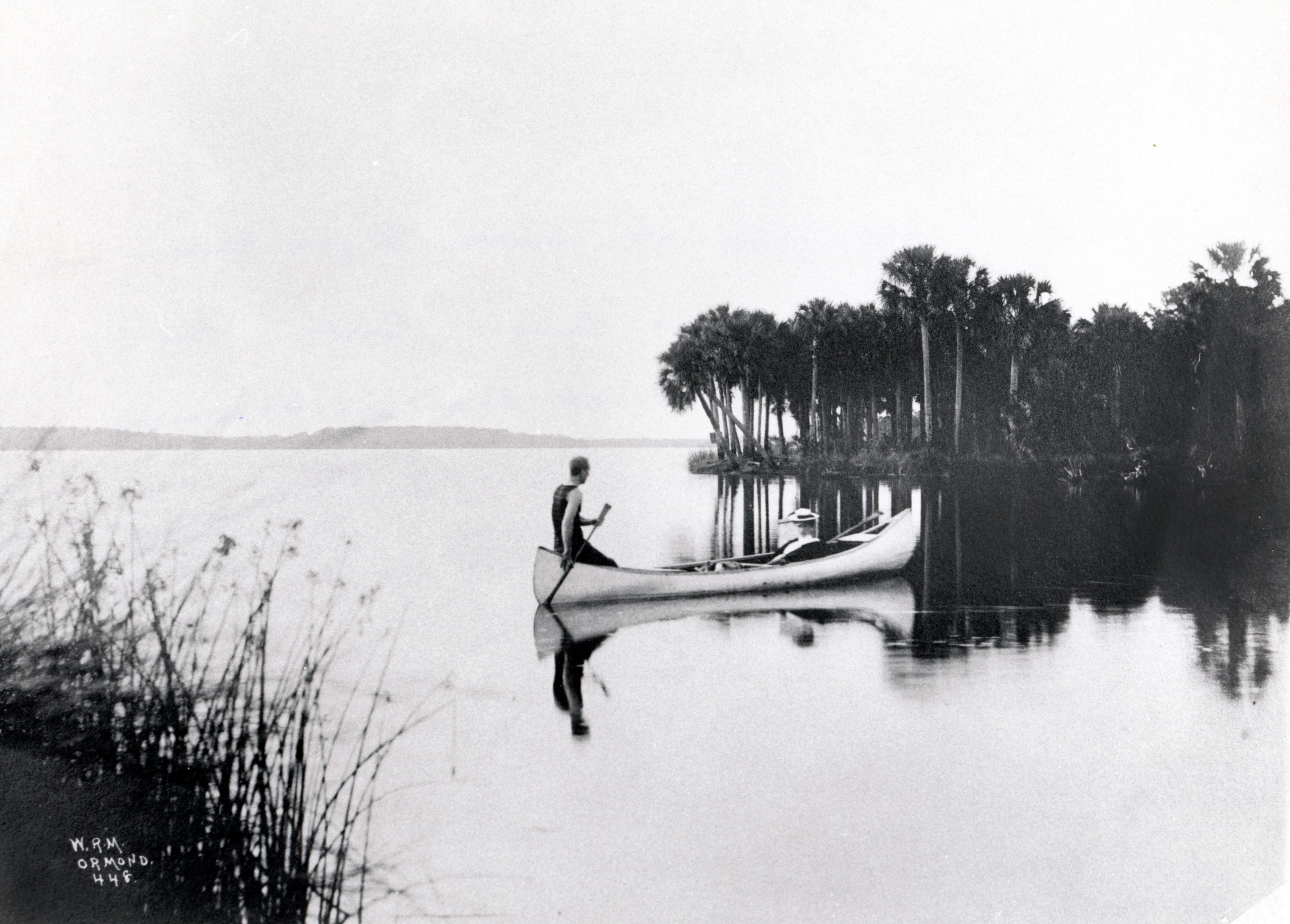 A couple canoeing at on the Tomoka River in the early 20th century.