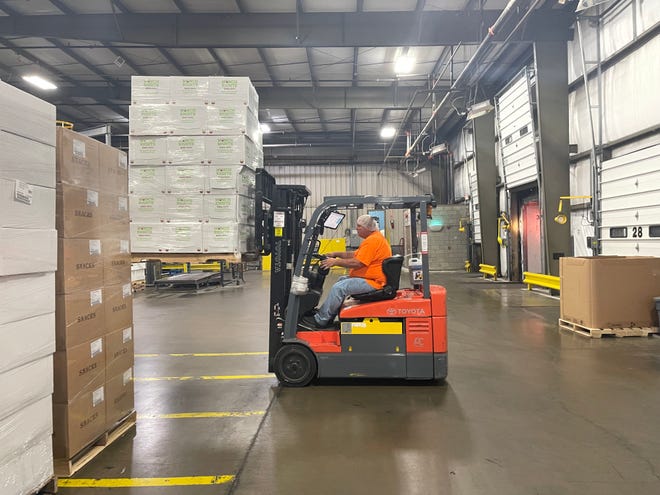 Brian Bryant, an employee at Wyandot Snacks, load a pallet of snacks that were shipped to Port Barre, Louisiana for relief from the impacts of Hurricane Ida. Wyandot Snacks sent more than 29,000 bags of chips to the area on Sept. 7, 2021.