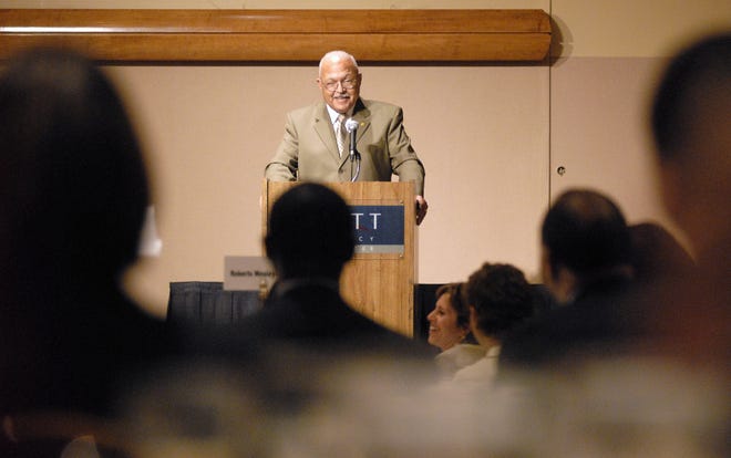 Bob Johnson, the former owner of Bob Johnson Chevrolet, of Sarasota, Florida speaks at the Rochester Black Business Association annual meeting and lunch at the Hyatt in Rochester, NY on Monday, November 26, 2007.