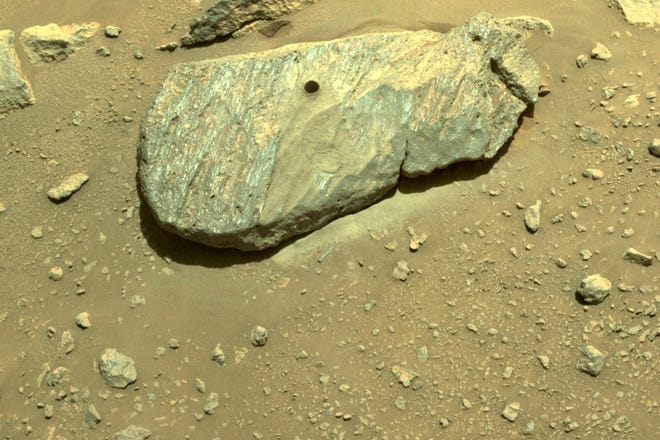 The Perseverance rover drilled a hole to collect  samples in Mars' Jezero Crater.