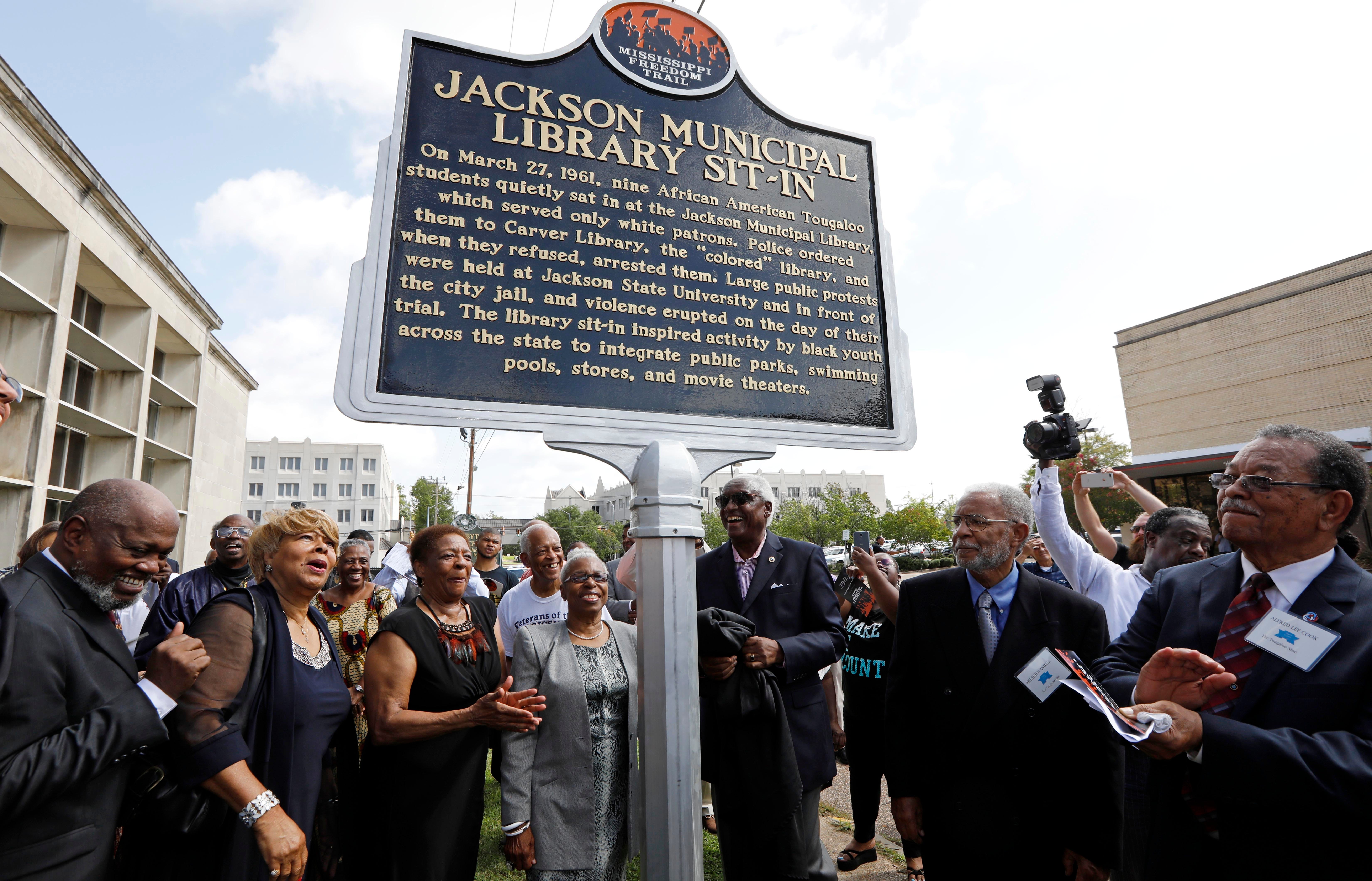 On Aug. 17, 2007, members of the Tougaloo Nine unveil the Mississippi Freedom Trail marker recognizing them for their peaceful sit-in at the Jackson Municipal Library in Jackson, Miss. The nine people arrested March 27, 1961, were students at the private Tougaloo College.
