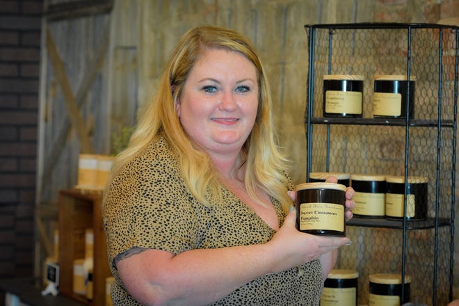 Julia Nickell has brought her popular hand poured, soy candle business to downtown Port Clinton.