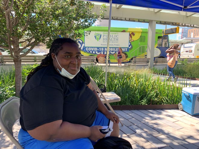 Jackie Edmonds received her first dose of the Pfizer vaccine on Wednesday, Sept. 8, 2021 at the Julia M. Carson Transit Center. The Marion County Public Health Department is hosting a weekly vaccination site through the month of September.