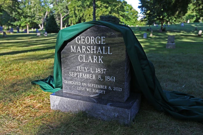 After 160 years, the unmarked grave of George Marshall Clark has a granite headstone. It was unveiled Wednesday at Forest Home Cemetery. Clark's death on Sept. 8, 1861, is the only recorded lynching in Milwaukee.