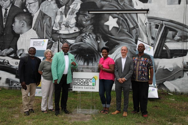 Project Boots is a new program in Jacksonville that hopes to increase homeownership and eradicate poverty in the Eastside of the city. From left: Rudy Jamison, Sherry McGill, Irvin Cohen, Suzanne Pickett, David Garfunkel and Bruce Moye.