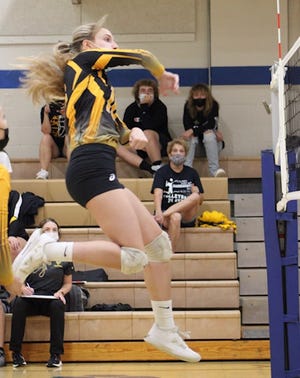 Keyser's Kaitlin Heavener jumps high and pounds the ball against Northern on Wednesday. Heavener had six aces, four kills, two blocks, three digs and nine points as the Lady Tornado defeated Northern three games to zero.