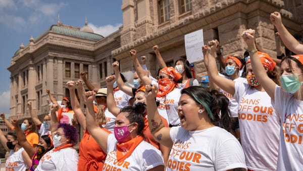 Women protest against the six-week abortion ban at