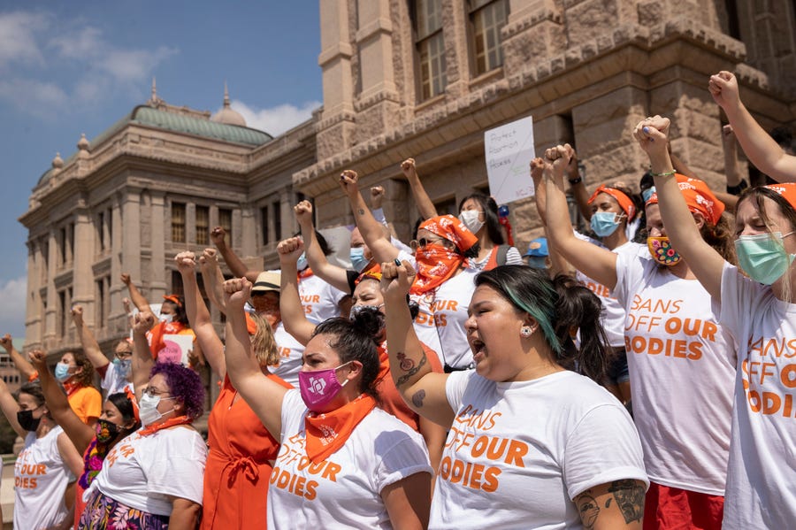Women protest against the six-week abortion ban at the Capitol in Austin, Texas, on Wednesday, Sept. 1, 2021.