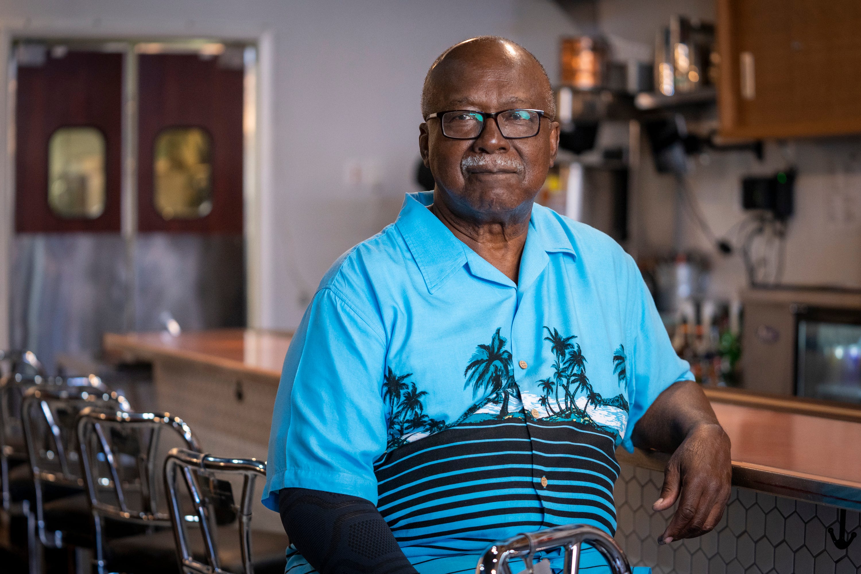 David Williamson, one of the Friendship Nine, sits for a portrait at the original McCrory's lunch counter, restored and preserved by the owners of Kounter, in Rock Hill, S.C., on Aug. 12, 2021.