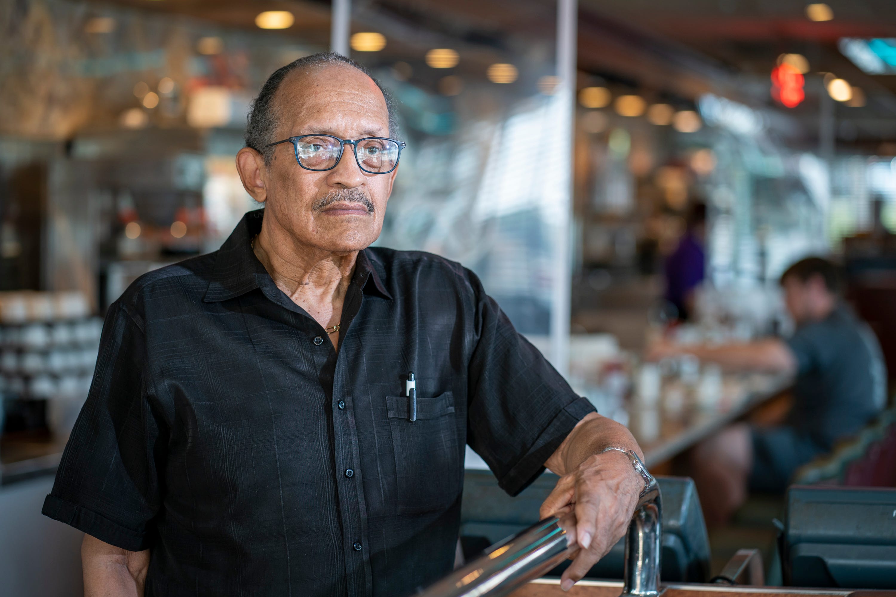 Charles Mason stands for a portrait in the Double T Diner, where he was arrested in a 1961 effort to desegregate the restaurant.