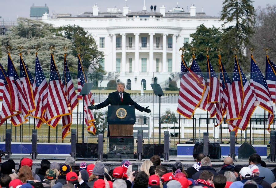 In this Jan. 6, 2021, file photo with the White House in the background, President Donald Trump speaks at a rally in Washington. Soon after he spoke, thousands of supporters marched on the Capitol, some of whom stormed the building.