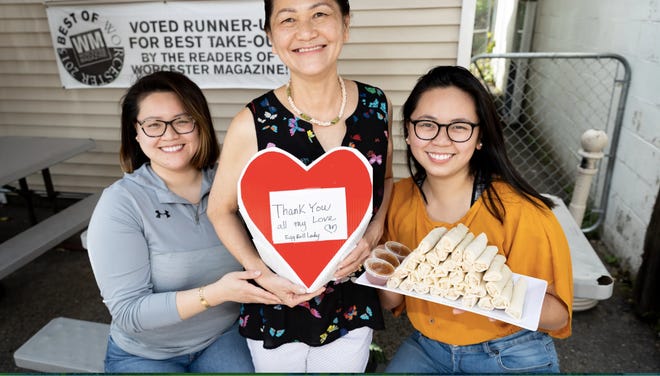 Owner of the Eggroll Lady and Fish Shack Phuong Lam, center, and her daughters Christina Bui and Gwendolyn Bui.