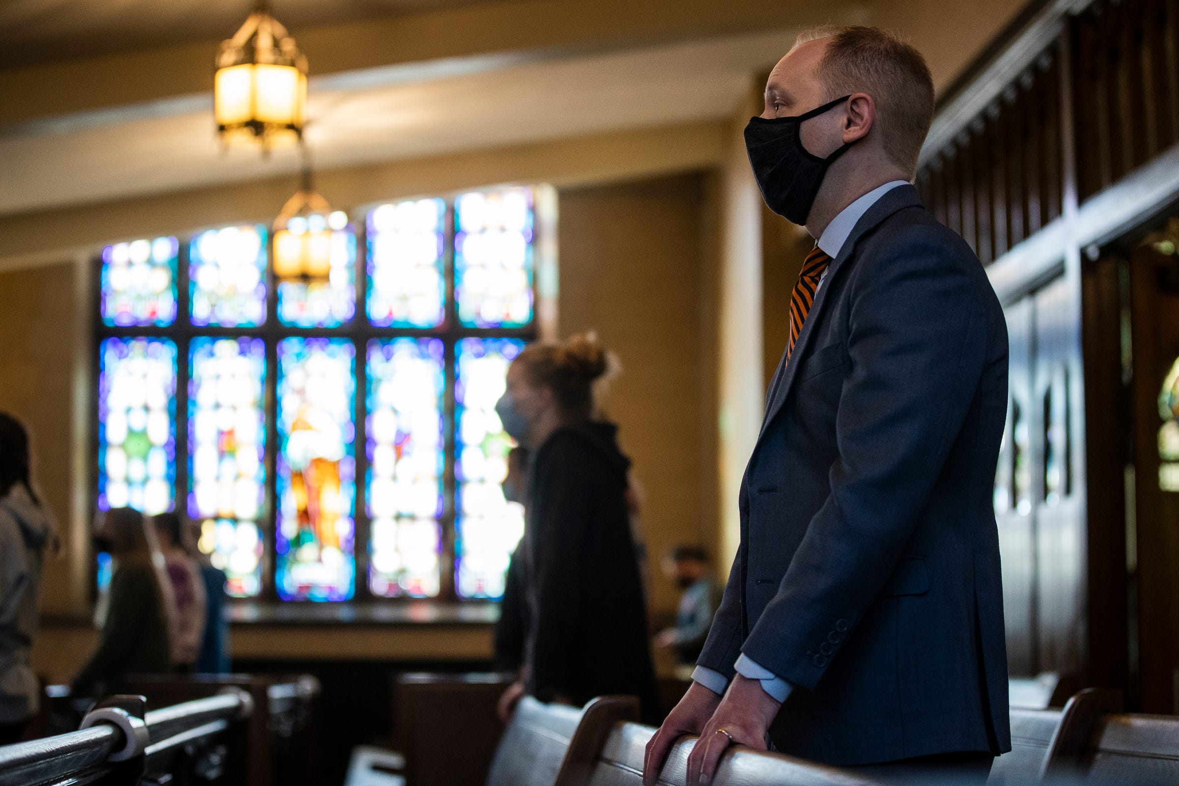 Hope College president Matthew A. Scogin attends a worship service at the Dimnent Memorial Chapel on campus in Holland, Wednesday, March 31, 2021.