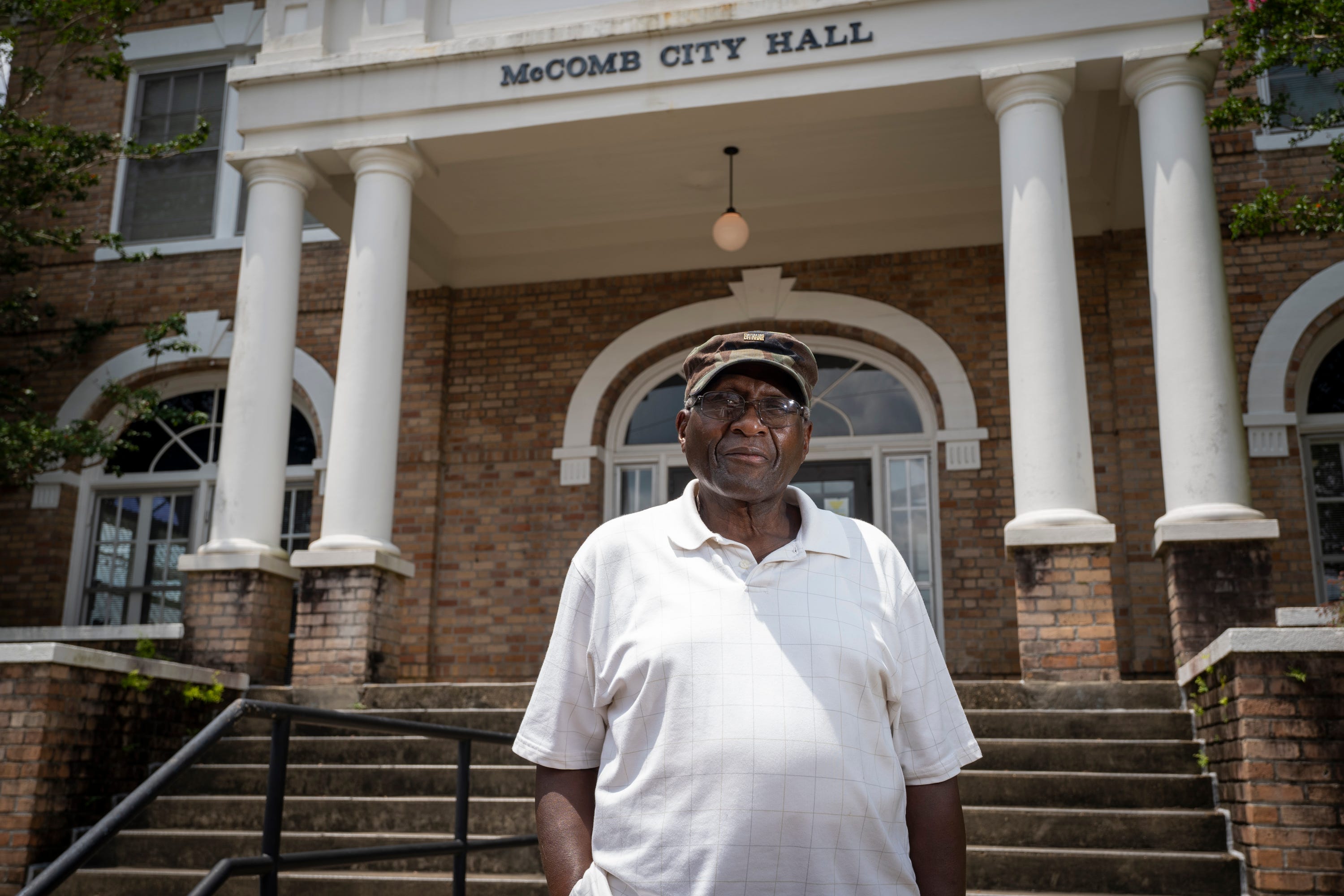 Robert "Bobby" Talbert, who was arrested along with Brenda Travis and Ike Lewis for sitting in the white-only section of the Greyhound bus station, stands outside the McComb City Hall in McComb, Miss., where they were initially held in a jail downstairs.