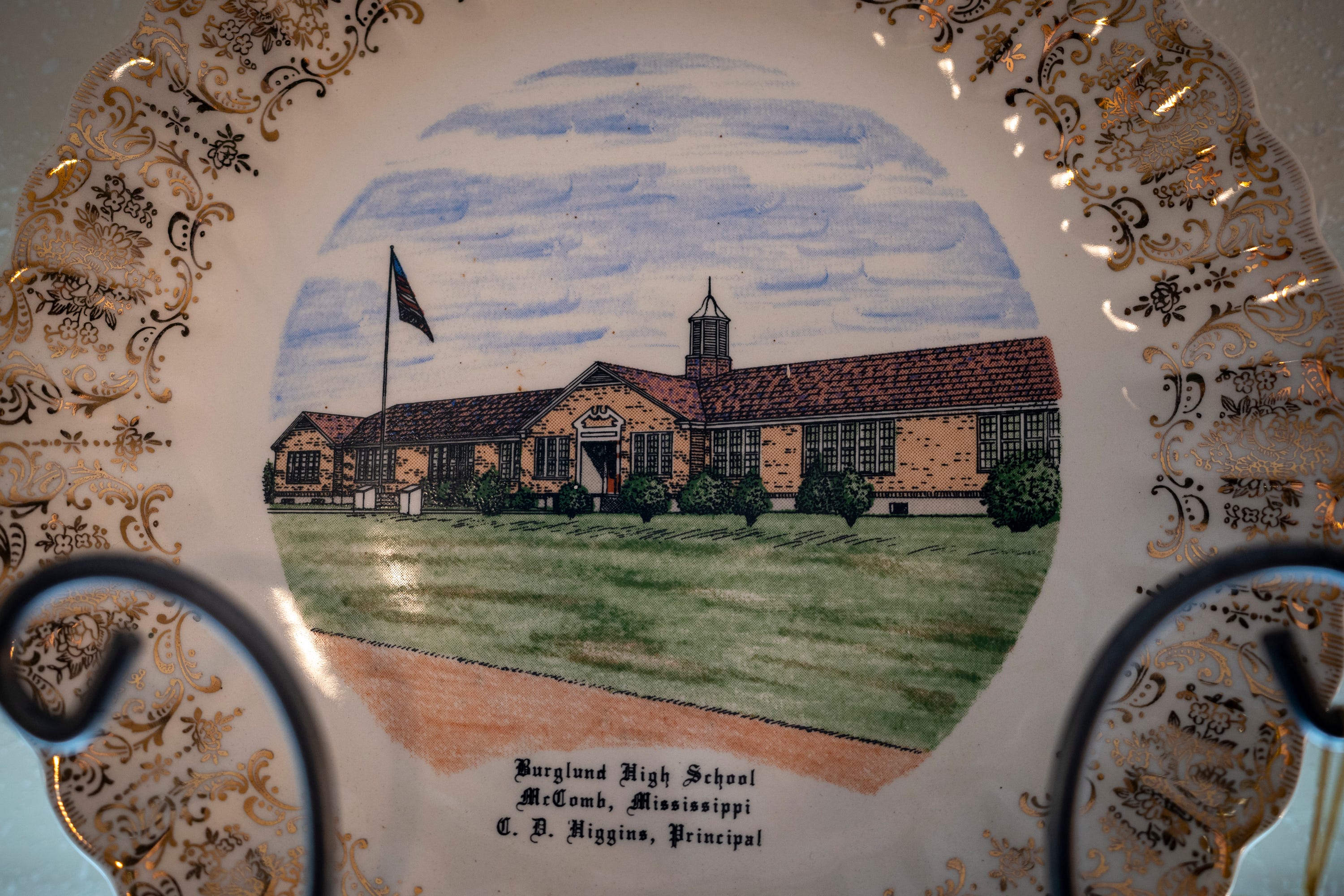 A plate commemorating Burglund High School is on display in the Black History Gallery in McComb, Miss.