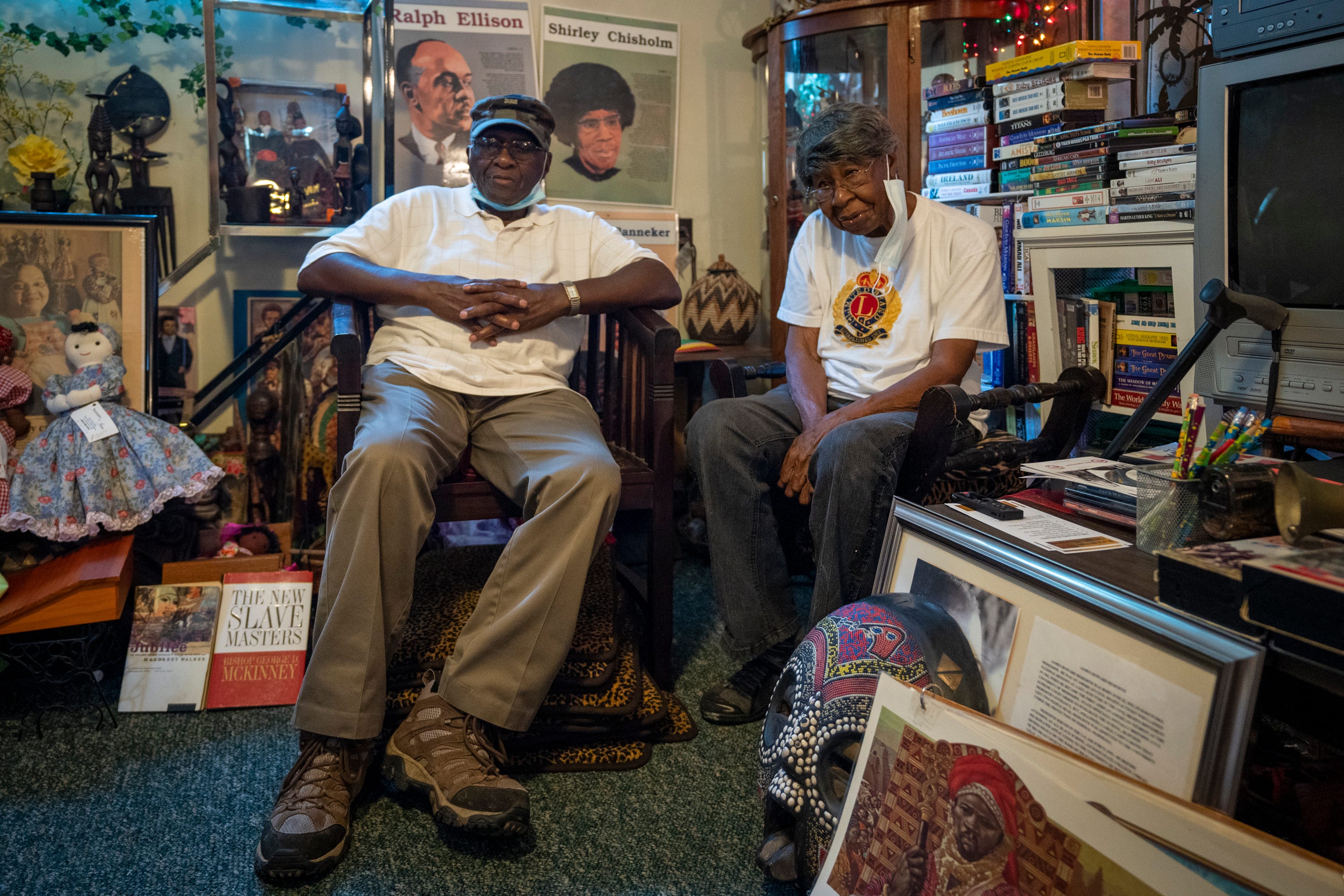 Robert "Bobby" Talbert, left, who was arrested along with Brenda Travis and Ike Lewis for sitting in the white-only section of the Greyhound bus station, and Hilda Casin, right, founder of the Black History Gallery, sit together in one of the gallery's several rooms packed with historical artifacts in McComb, Miss.