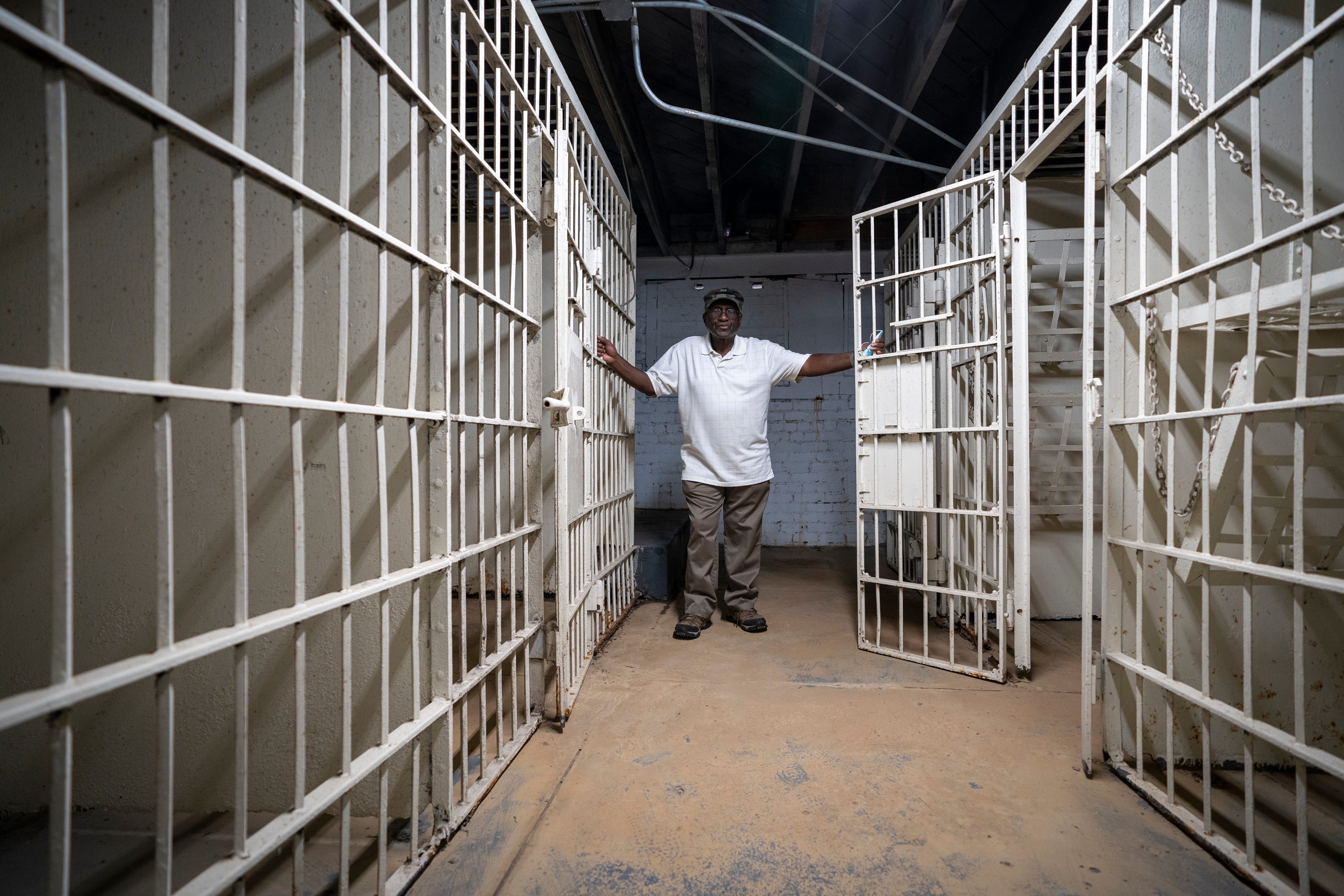 Robert "Bobby" Talbert, who was arrested along with Brenda Travis and Ike Lewis for sitting in the white-only section of the Greyhound bus station, stands in the basement jail of McComb City Hall where they were initially held in McComb, Miss.