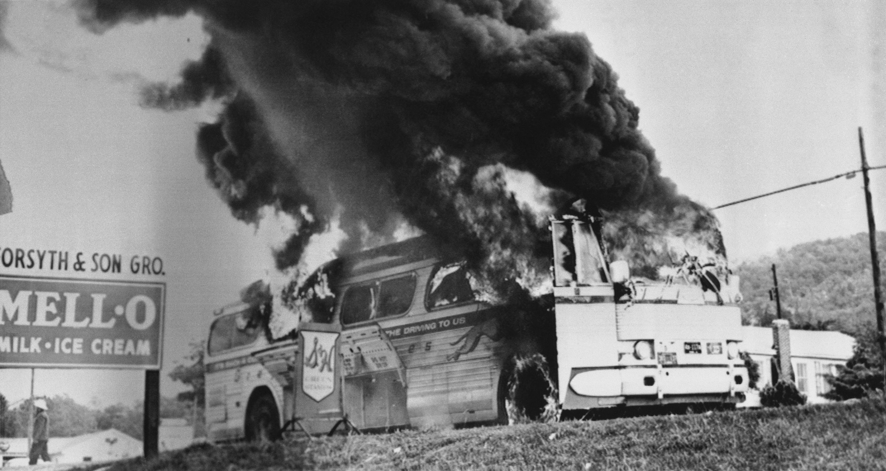 A Freedom Rider bus went up in flames when a firebomb was tossed through a broken window near Anniston, Ala., May 14, 1961. The bus, which was testing bus station segregation in the South, had stopped due to flat tires inflicted by a white mob at the Anniston bus station. Passengers escaped without serious injury, but endured beatings by a white mob that followed the bus as it left Anniston.